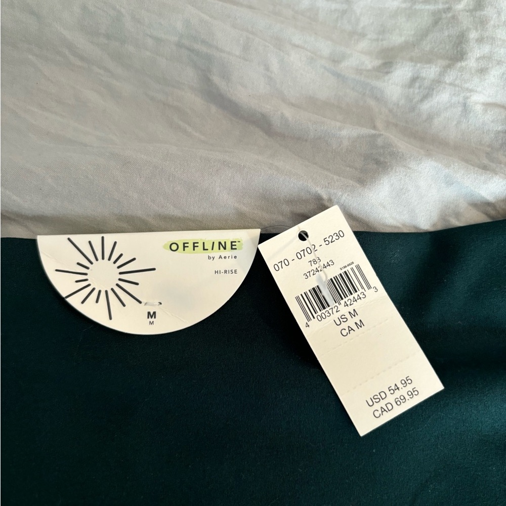 New Dark Green Aeri leggings with wide bottom.